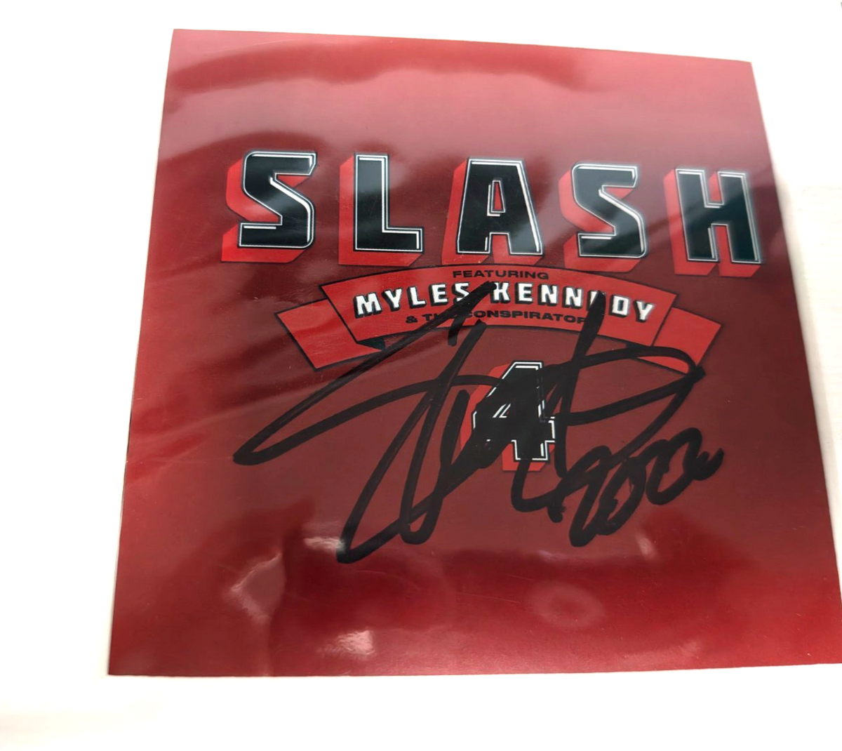 Slash Hand Signed presentation 12" x 18" by Autograph